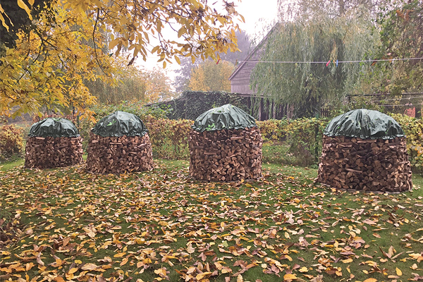 abdeckplane_brennholz_rund_vorschau Holzabdeckplane grün - rund mit Ösen - 210 g/m²