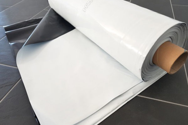 baufolie_schwarz_weiss auf Rolle geliefert