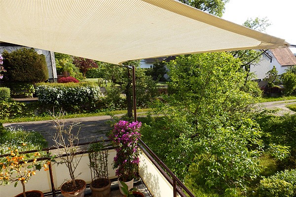 Sonnensegel-Montage und Befestigung